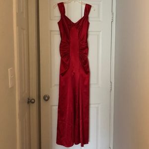 Red satin evening gown by Jessica McClintock